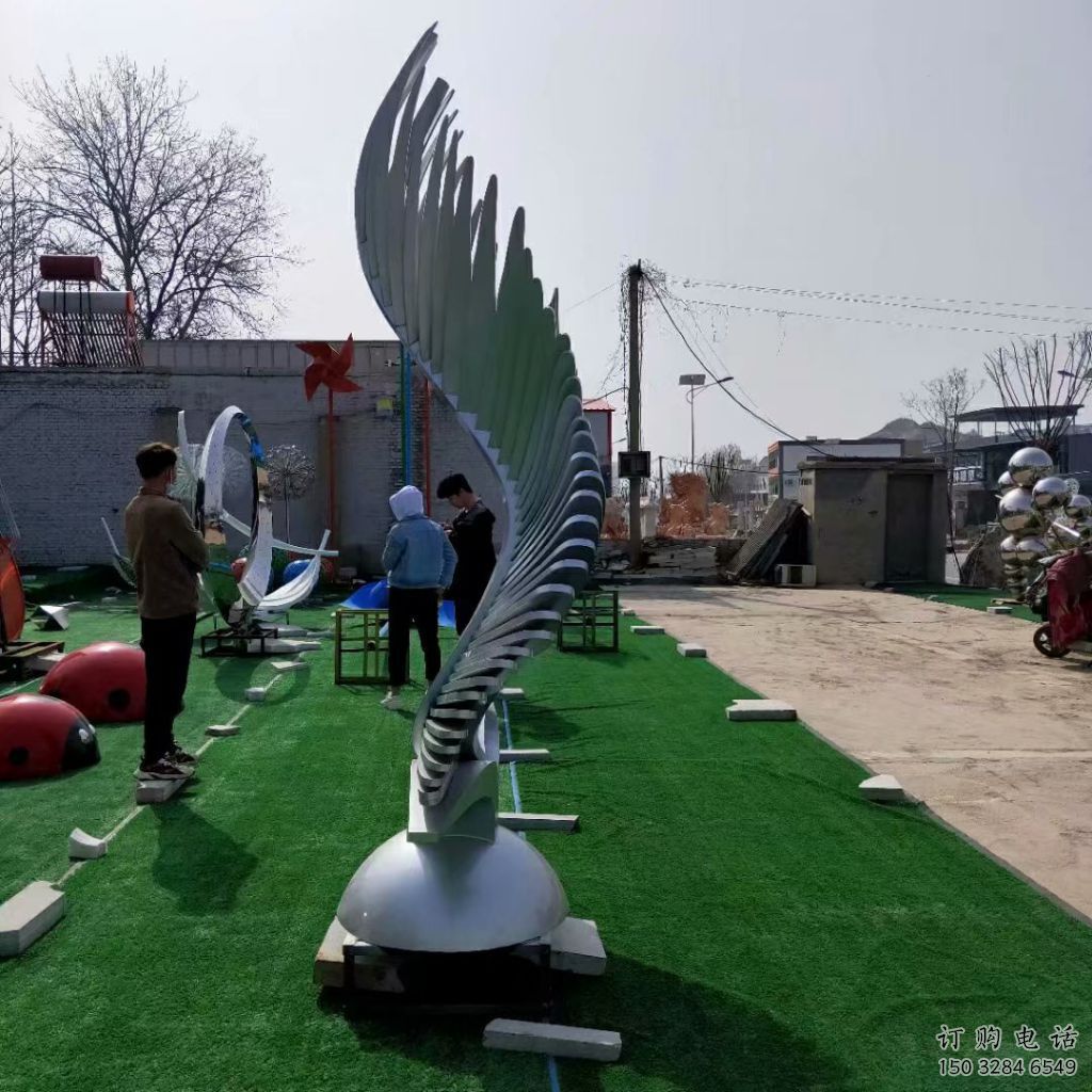 校園翅膀雕塑供應(yīng)商，拉絲景觀雕塑，抽象主題