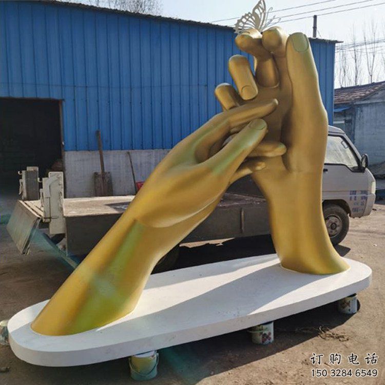握手雕塑生產(chǎn)商，小區(qū)雕塑，不銹鋼握手雕塑廠家展品