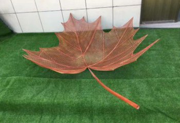 鏤空樹葉雕塑，景區(qū)雕塑，鐵藝樹葉雕塑廠家指用