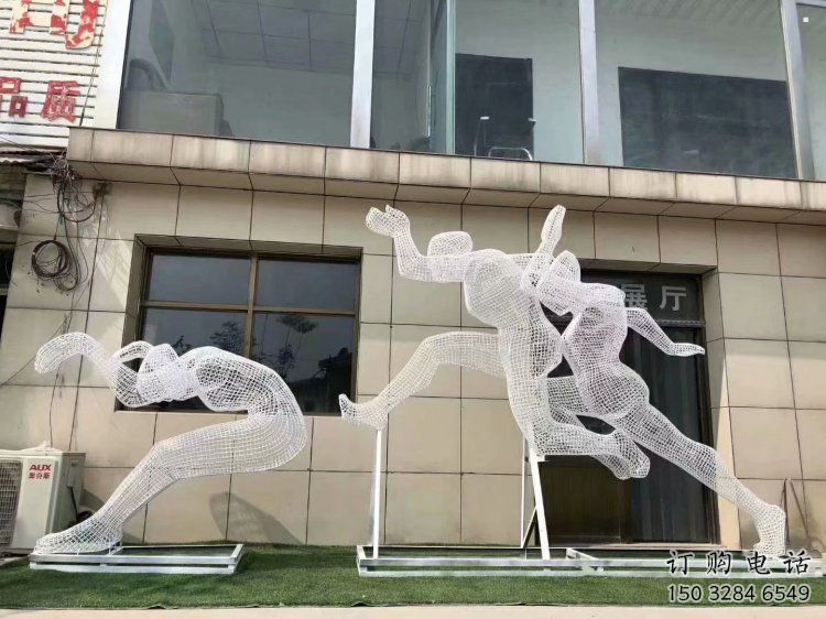 鏤空運(yùn)動員雕塑生產(chǎn)，廣場雕塑，鐵藝體育人物雕塑展品