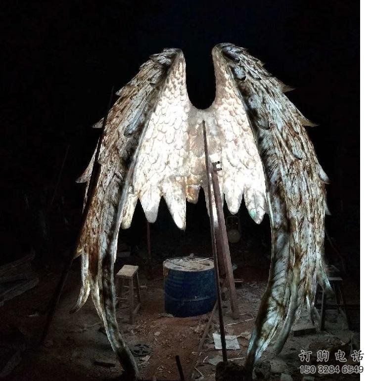 城市翅膀雕塑，網(wǎng)格燈光雕塑，古銅效果